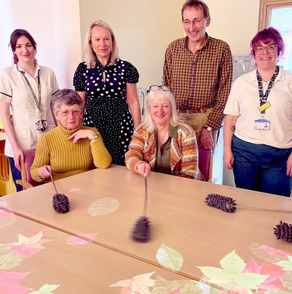 Staff demonstrate the system to choir members